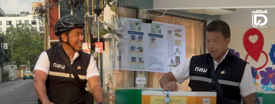 曼谷市长查察骑自行车前往投票站，强调透明度是民主的第一步