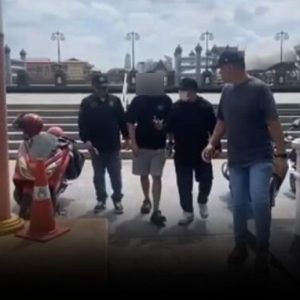 中国男子持精英签在泰非法带团被捕